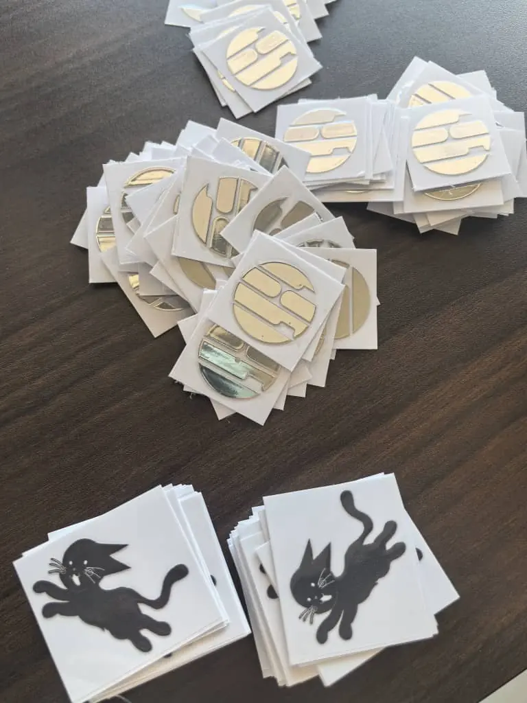 Silver foil stickers produced for the Maldives band